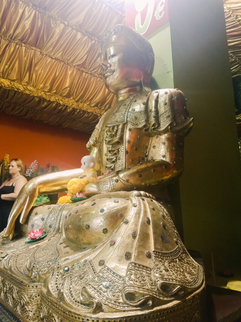 A gold Buddha statue. If you're looking for unique things to do in Prague, indulge in a Thai foot massage.