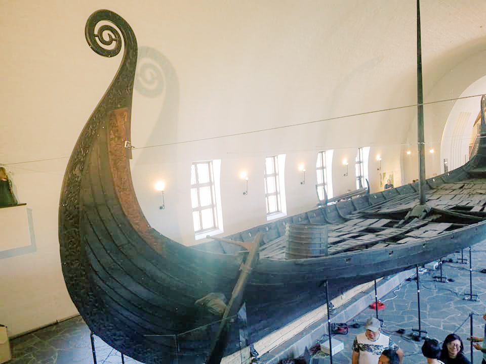 Close up of a large Viking ship displayed in a museum