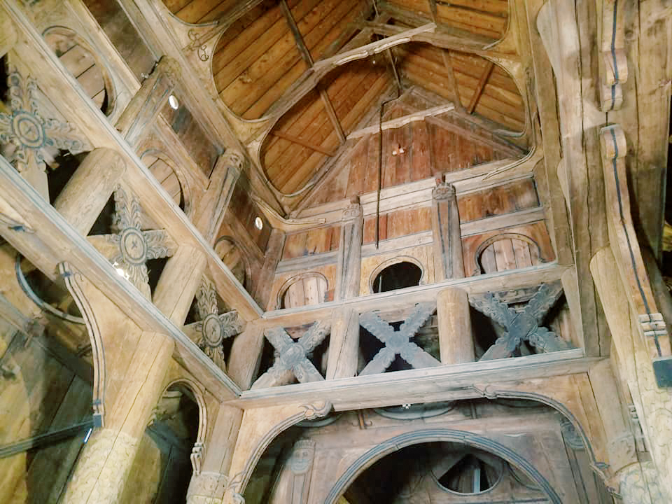 Photo of the wooden beams inside of the stave church
