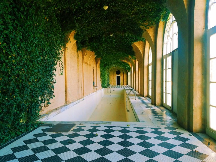 Indoor pool with black and white tile on Long Island at Oheka Castle, the inspiration used for the Great Gatsby