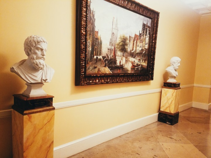 Busts and painting found outside of our hotel room at Oheka Castle on Long Island, the inspiration for the Great Gatsby
