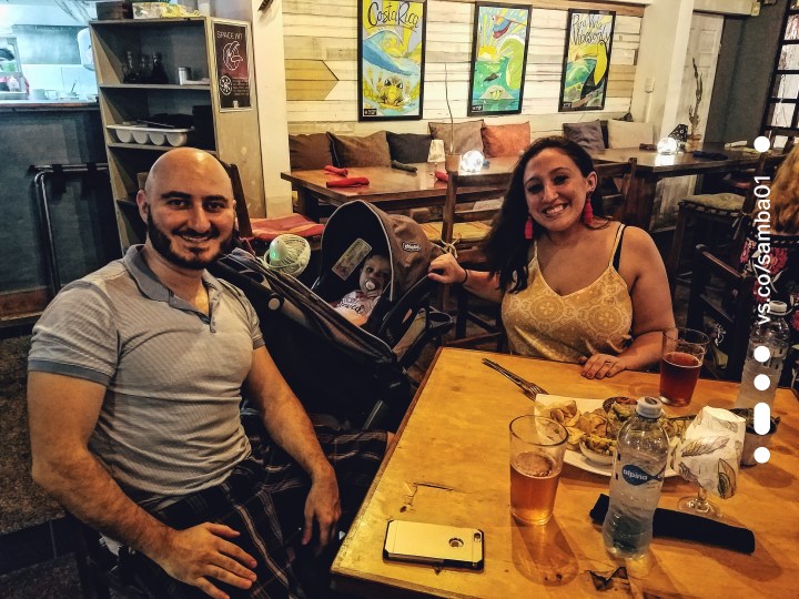 A family poses for a picture at The Green room restaurant. One of the best places for eating in Jaco, Costa Rica