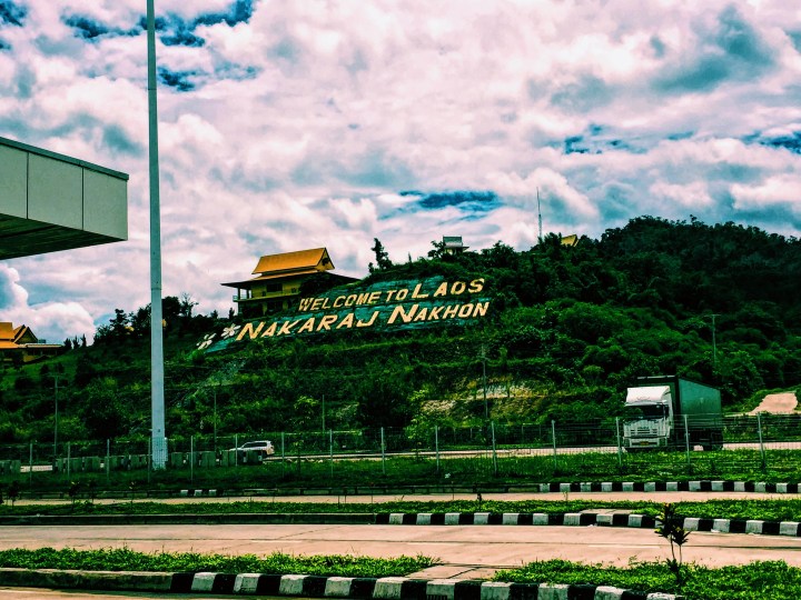 The "Welcome to Laos" sign in the hills of Pak Beng