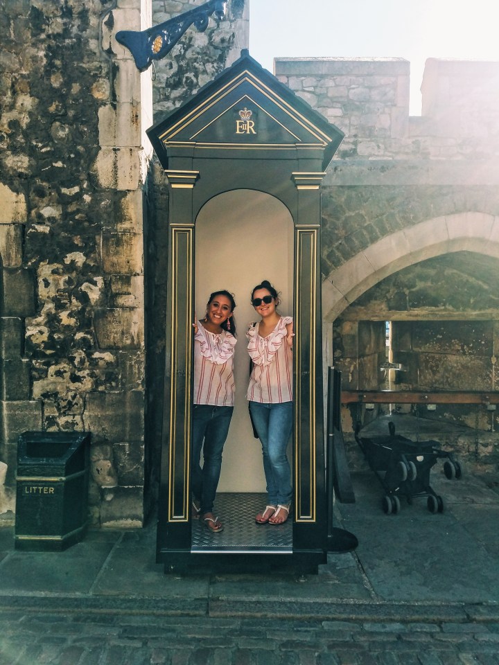 Posing at the Tower of London. Check it out during your first time in London.