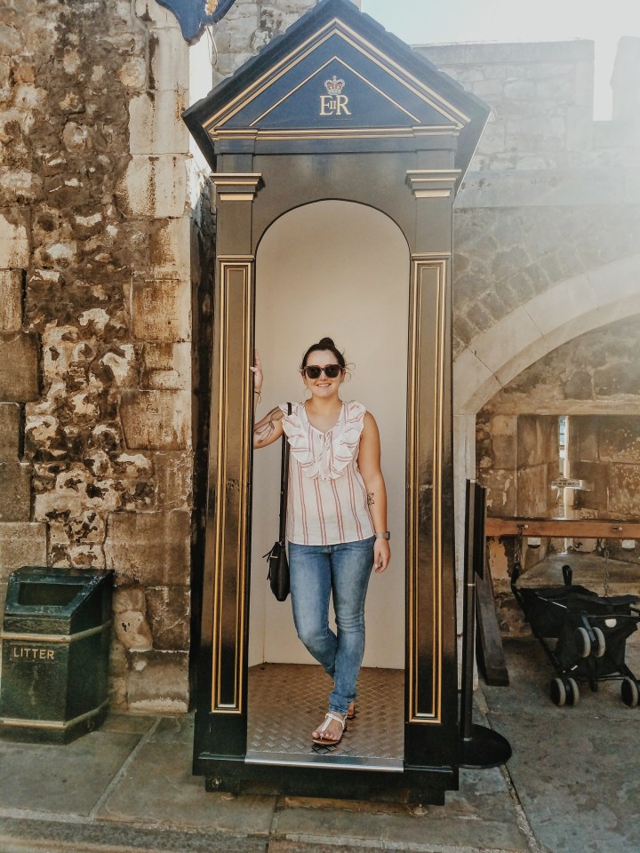 Posing at the Tower of London. Check it out during your first time in London.