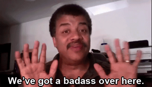 A gif of a man holding up his hands with the words "We've got a badass over here."