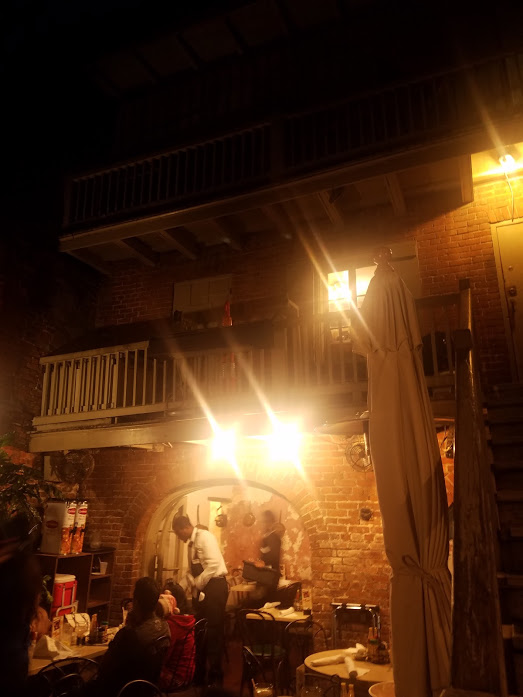 The back courtyard dining area of The Gumbo Shop