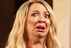 A gif image of a horrified woman's face.
