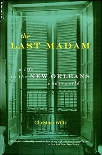 The front cover of the novel, "The Last Madam." It is a green cover with yellow and white writing. 