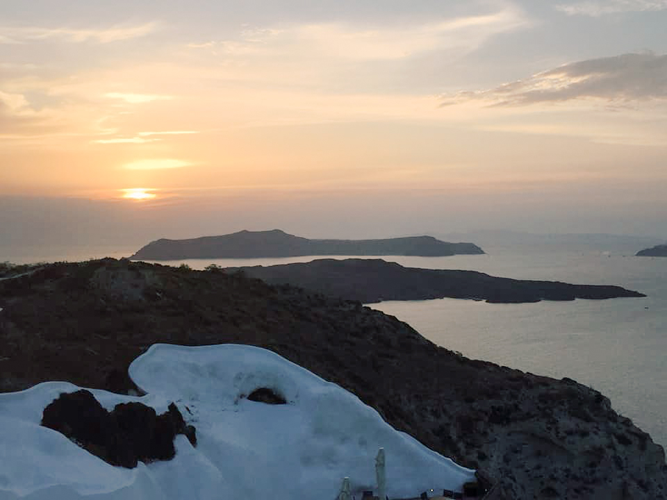 Photo of a sunset in Santorini