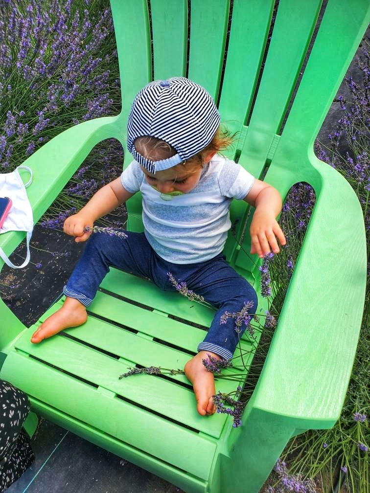 A child sits on a chair 