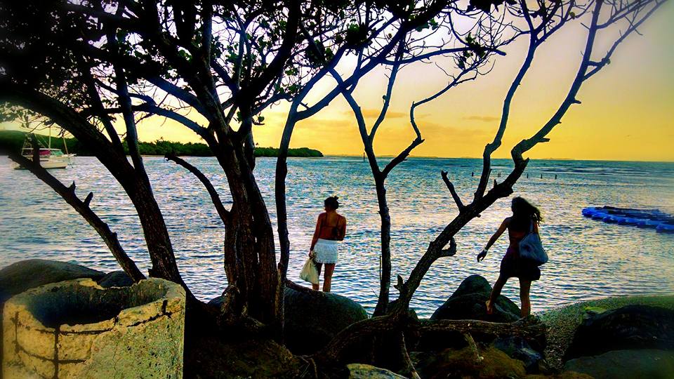 Two women wait to begin the Kayak tour of the bio-luminescent bay