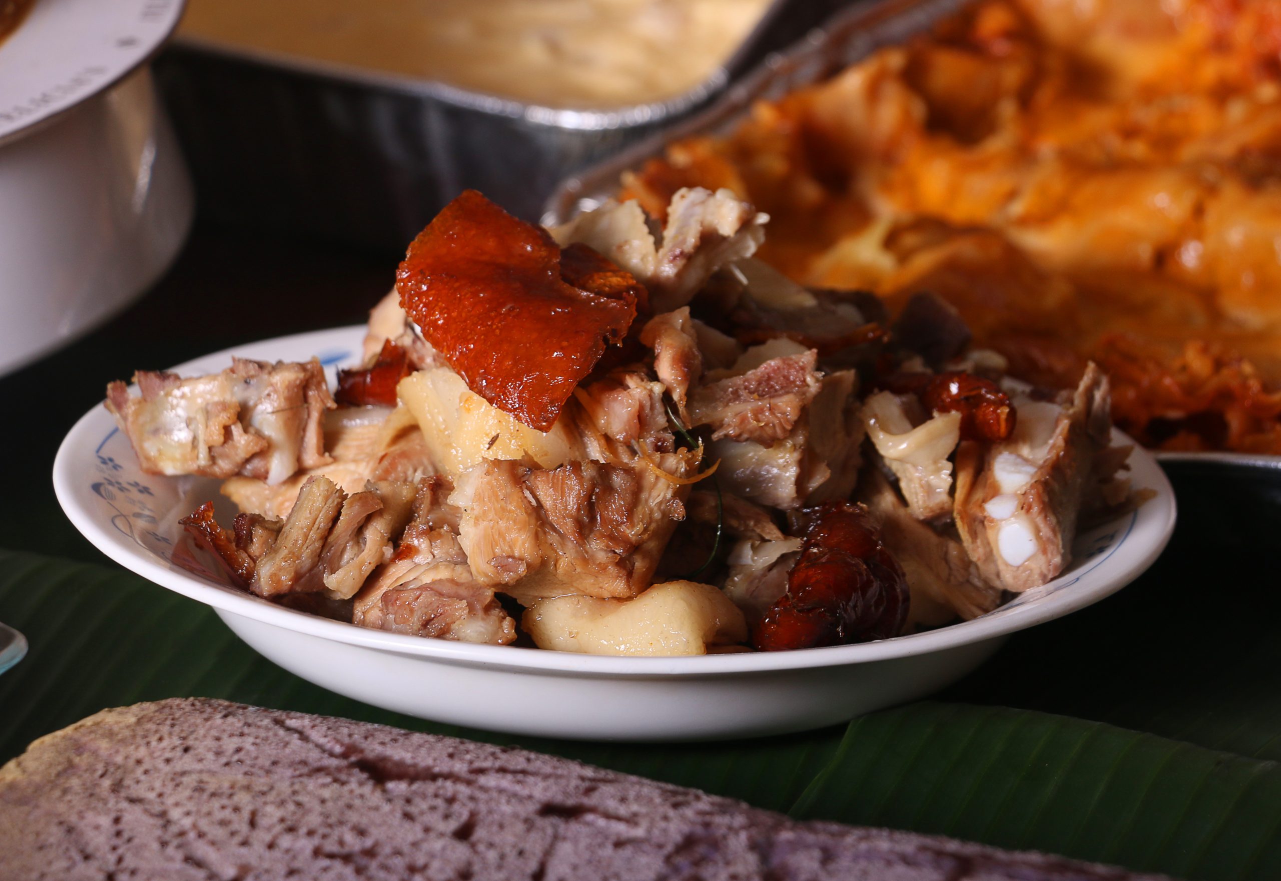 A photo of lechon asado in a dish