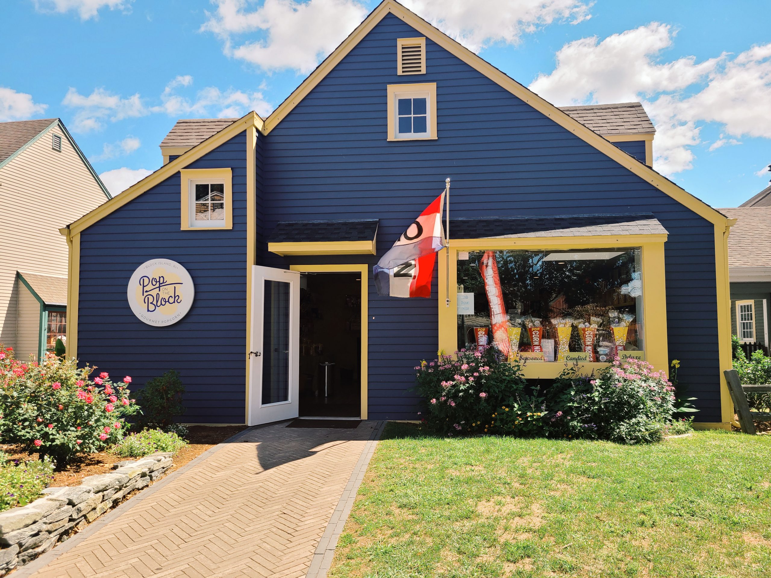 The exterior of a shop called "Pop on the Block" in Mystic, Connecticut