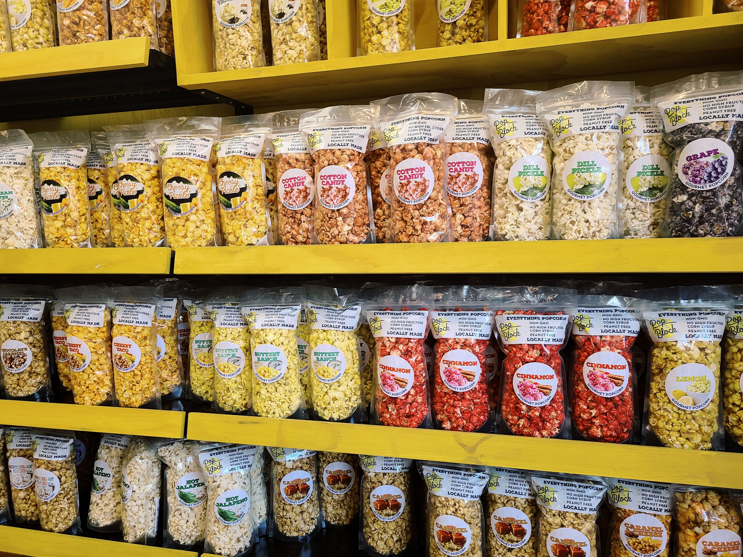 Bags of popcorn in an assortment of creative flavors