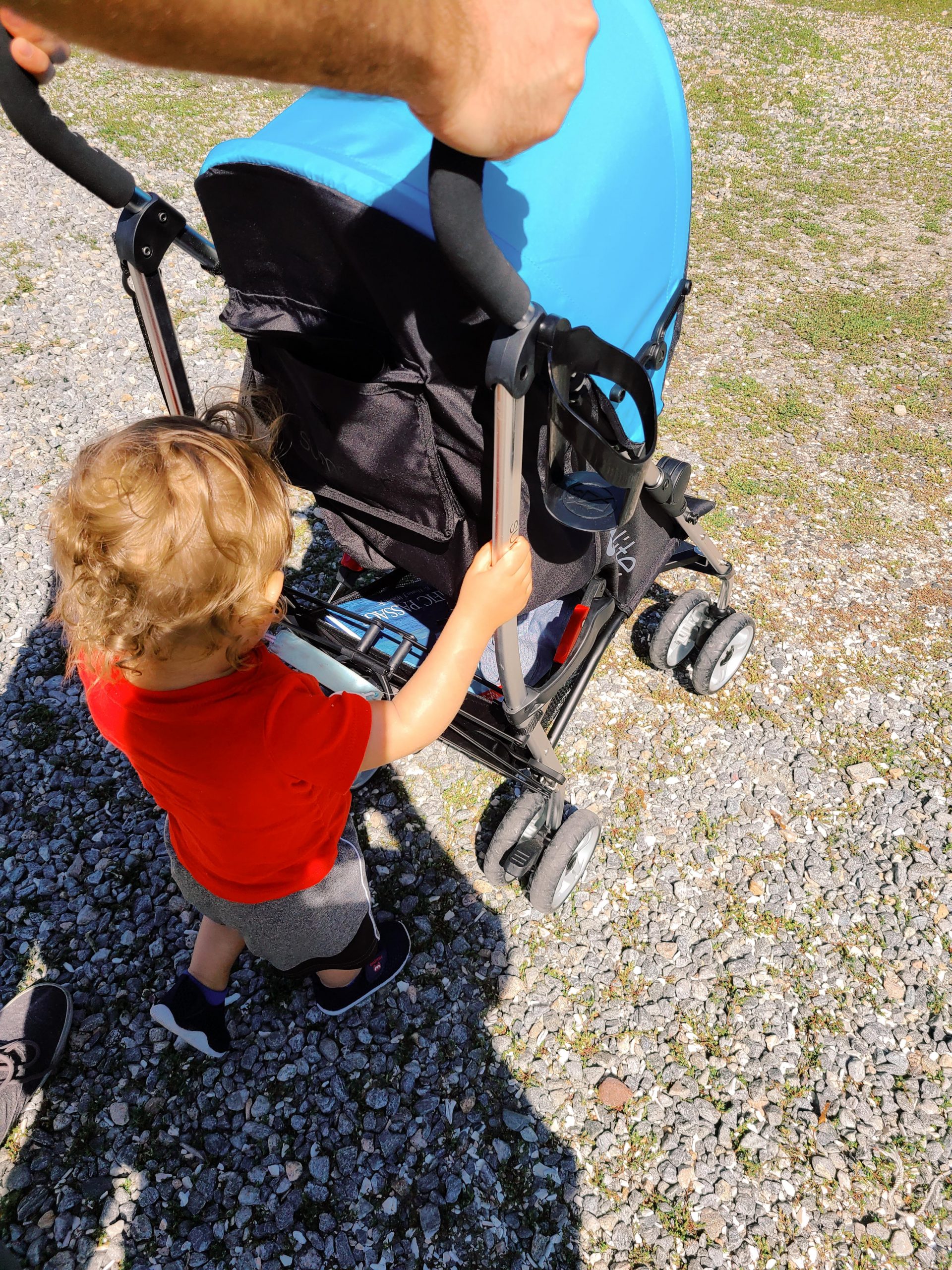 A child pushes a stroller