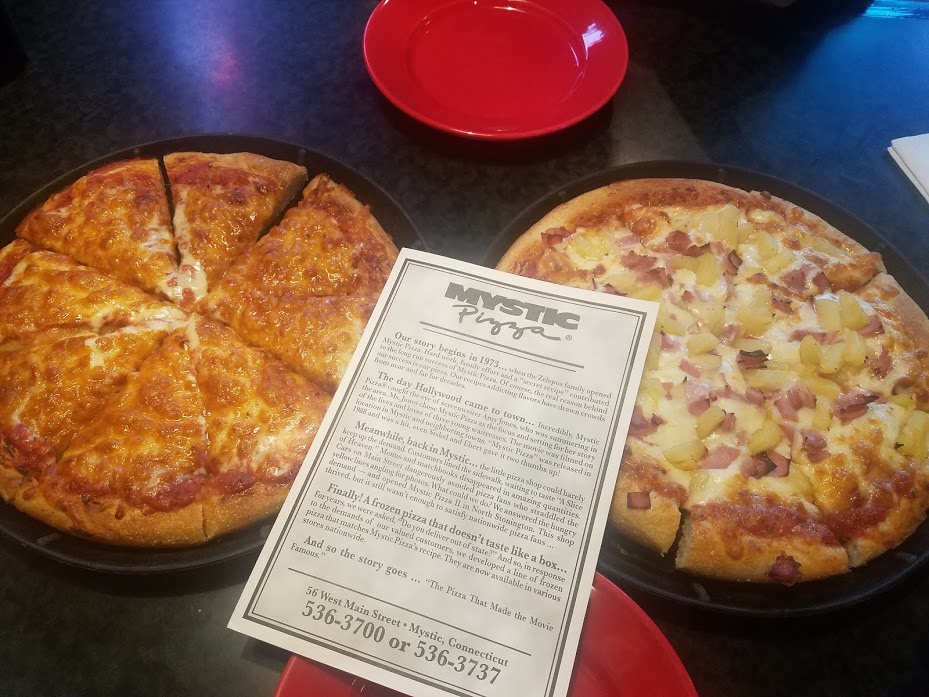 A photo of two pizzas 