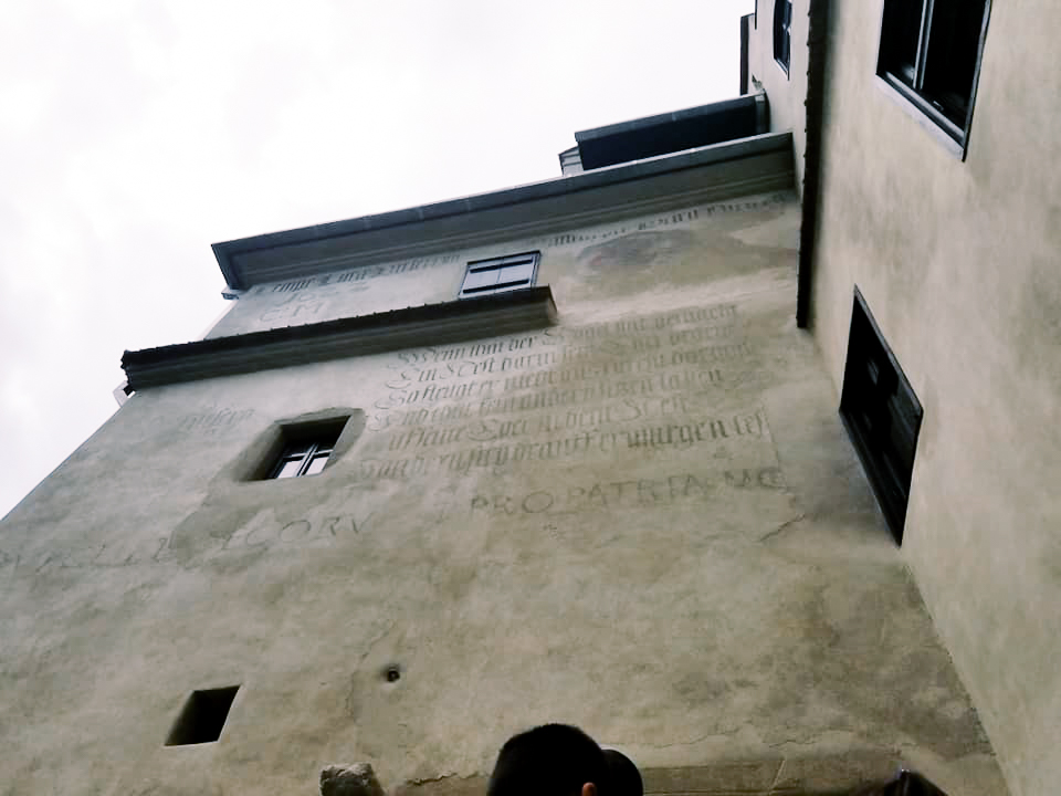 A photo looking up the walls of Bran Castle