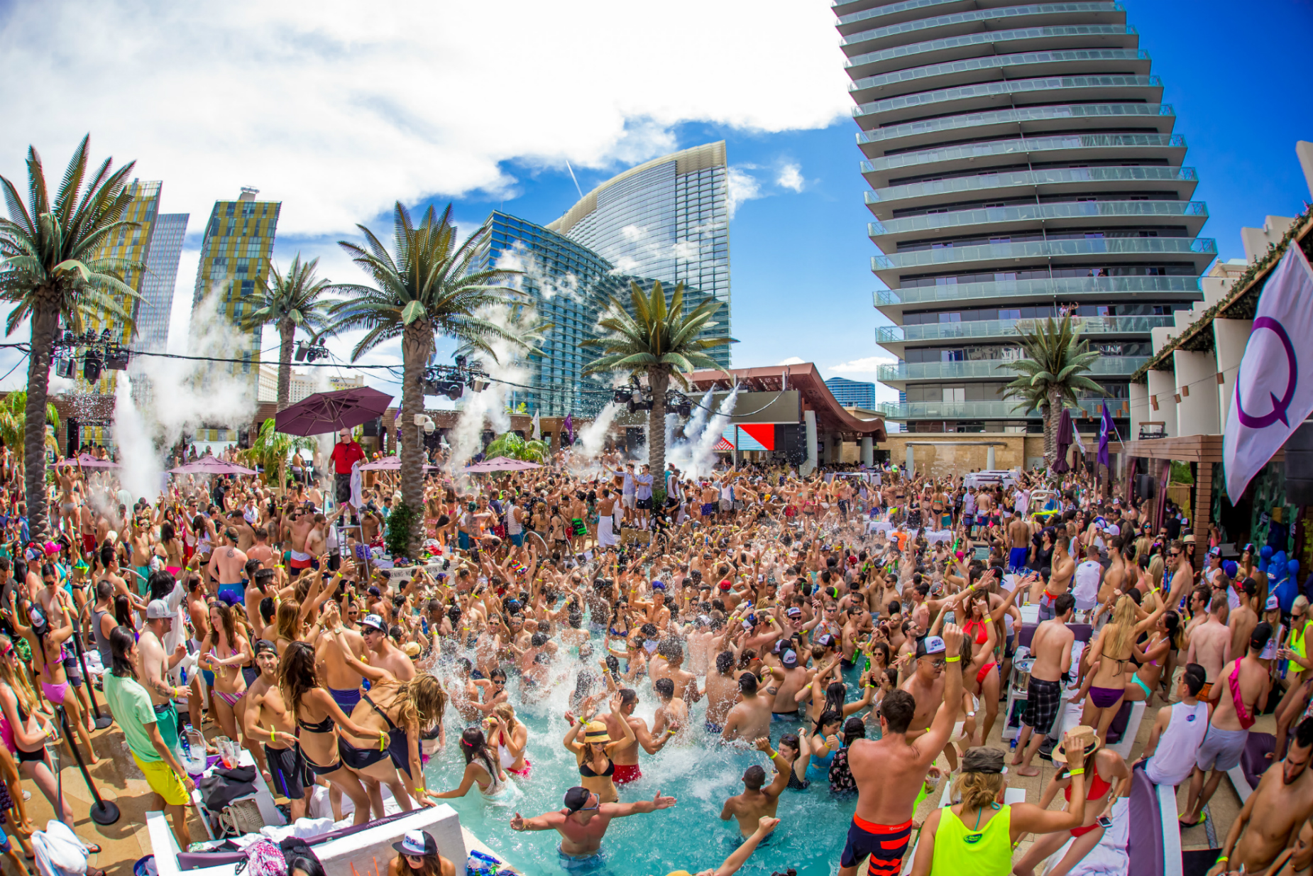 A crowed of people in a pool in Vegas