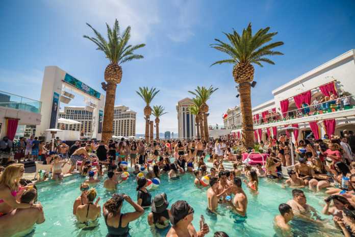 Are Vegas pool parties worth it? A crowd of people gather in a pool at a resort