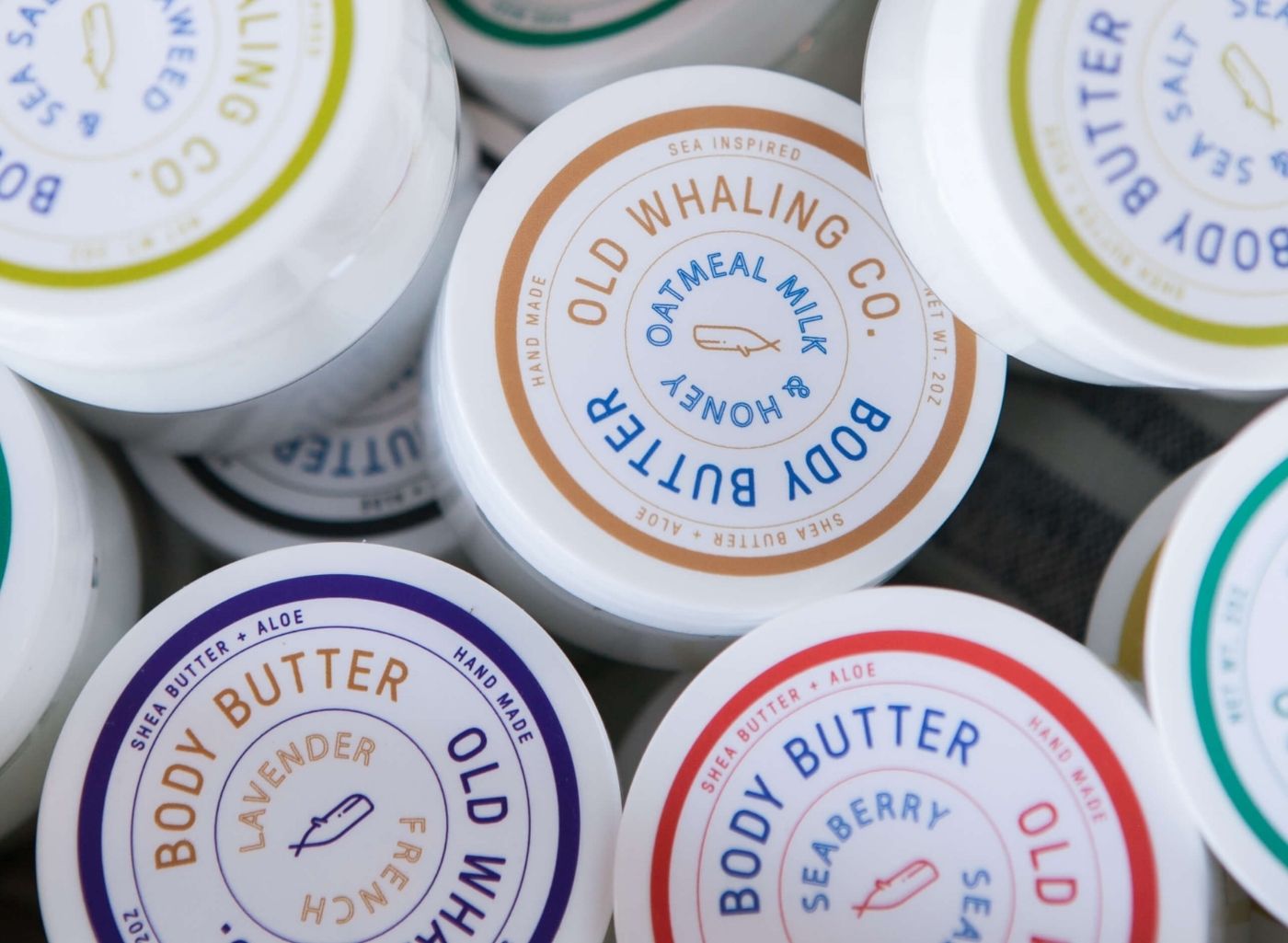 Cans of body butter from old whaling co.