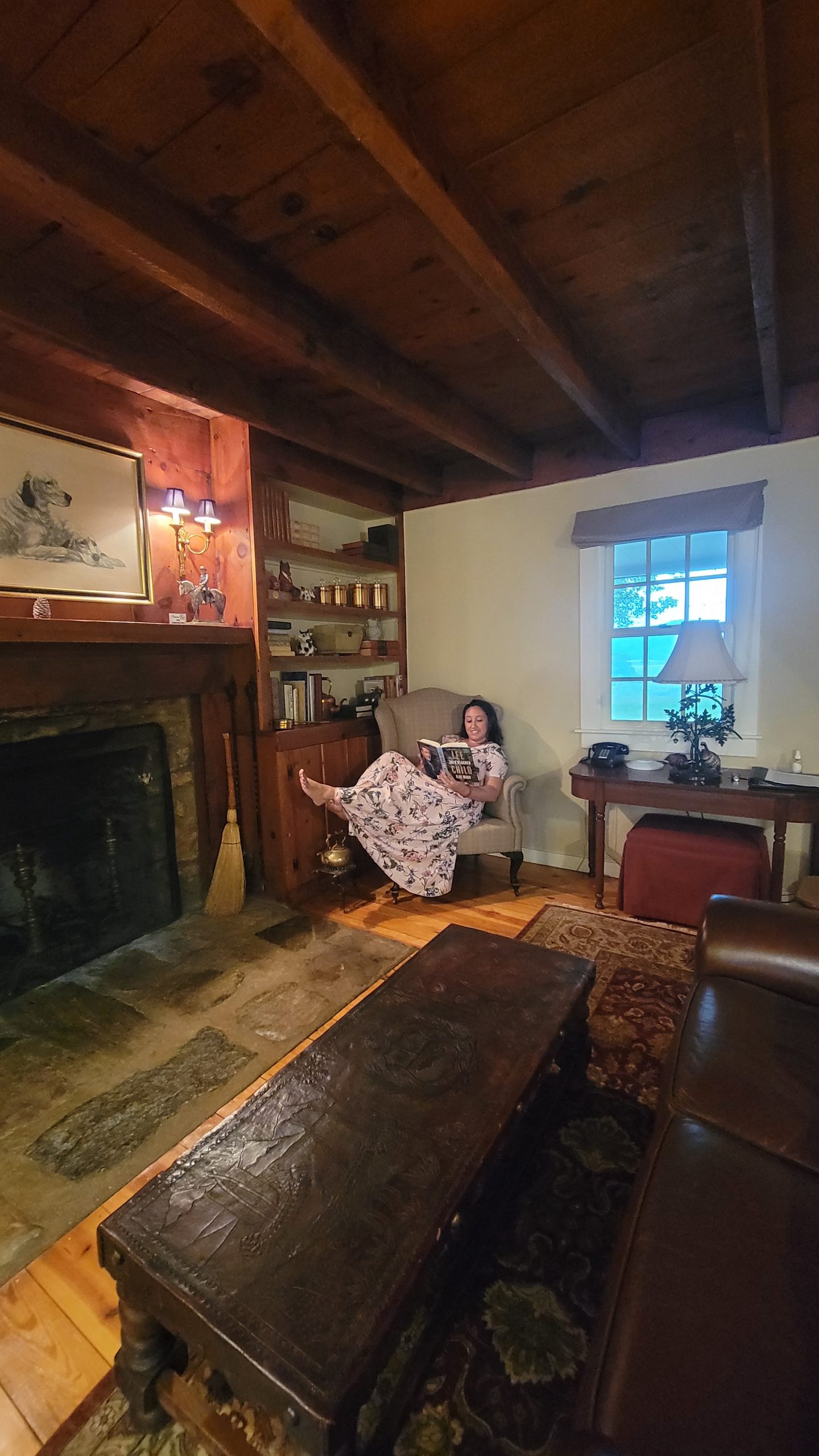 Reading a book at the Inn at Mount Vernon Farm